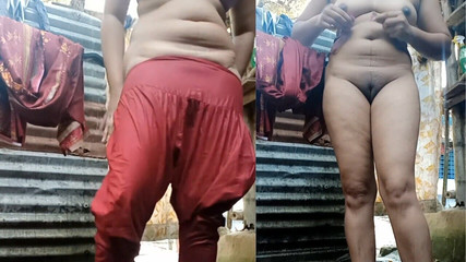 स्नान के बाद पोशाक पहनना। बांग्लादेशी सादिया भाभी ड्रेस पहने हुए